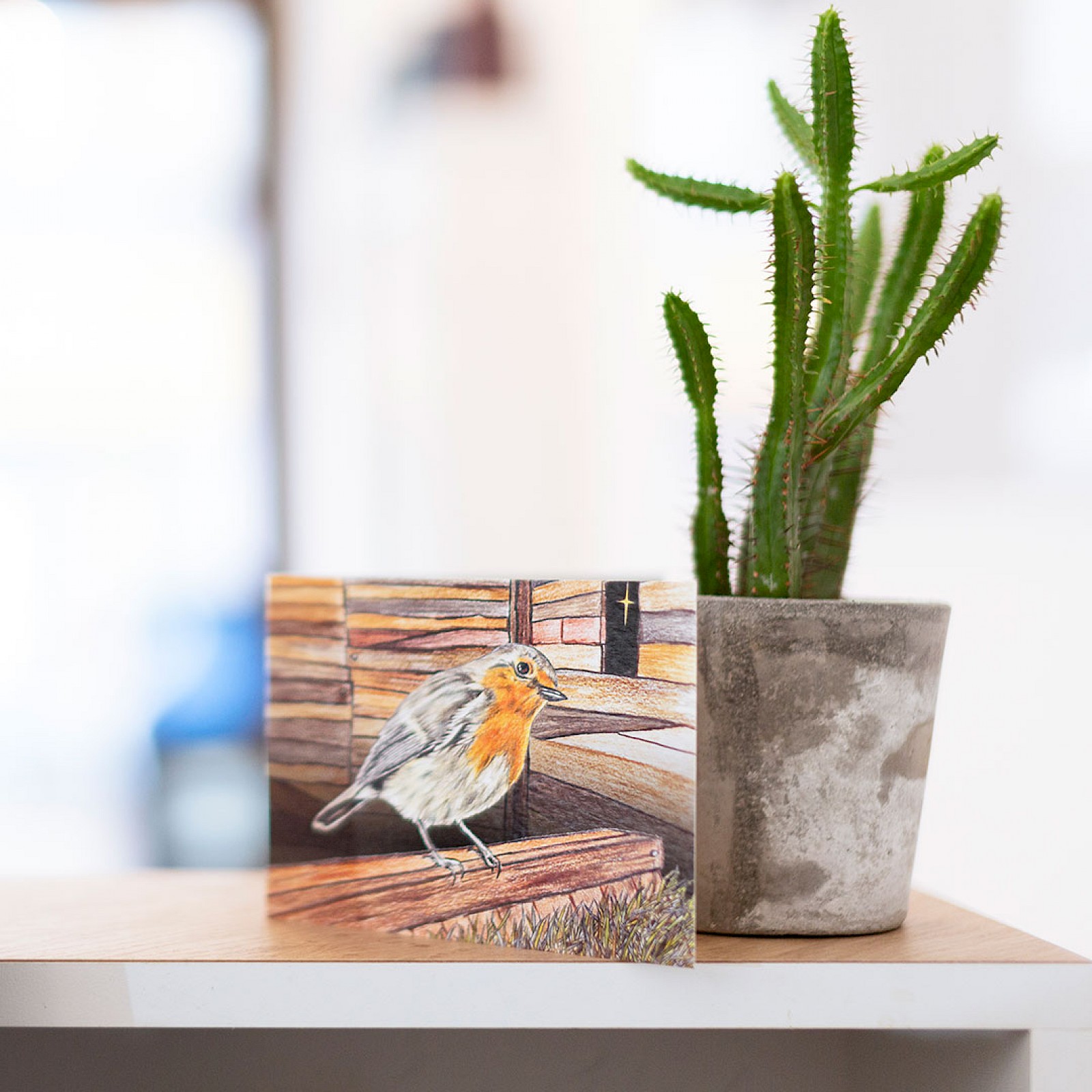 Austin lafferrty reception desk with a picture of a robin